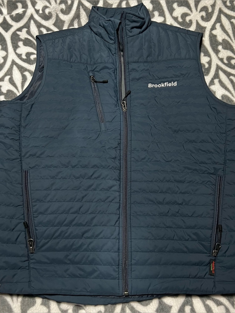 Storm Creek Men’s Navy Puffer Vest Brookfield Illinois Embroidery
Size Large